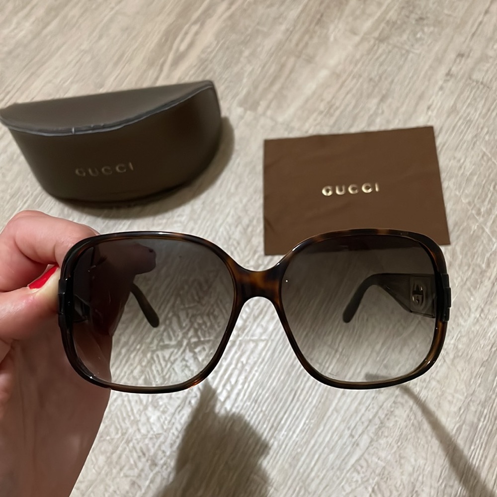 Gucci brown tortoise large frame womens sunglasses.